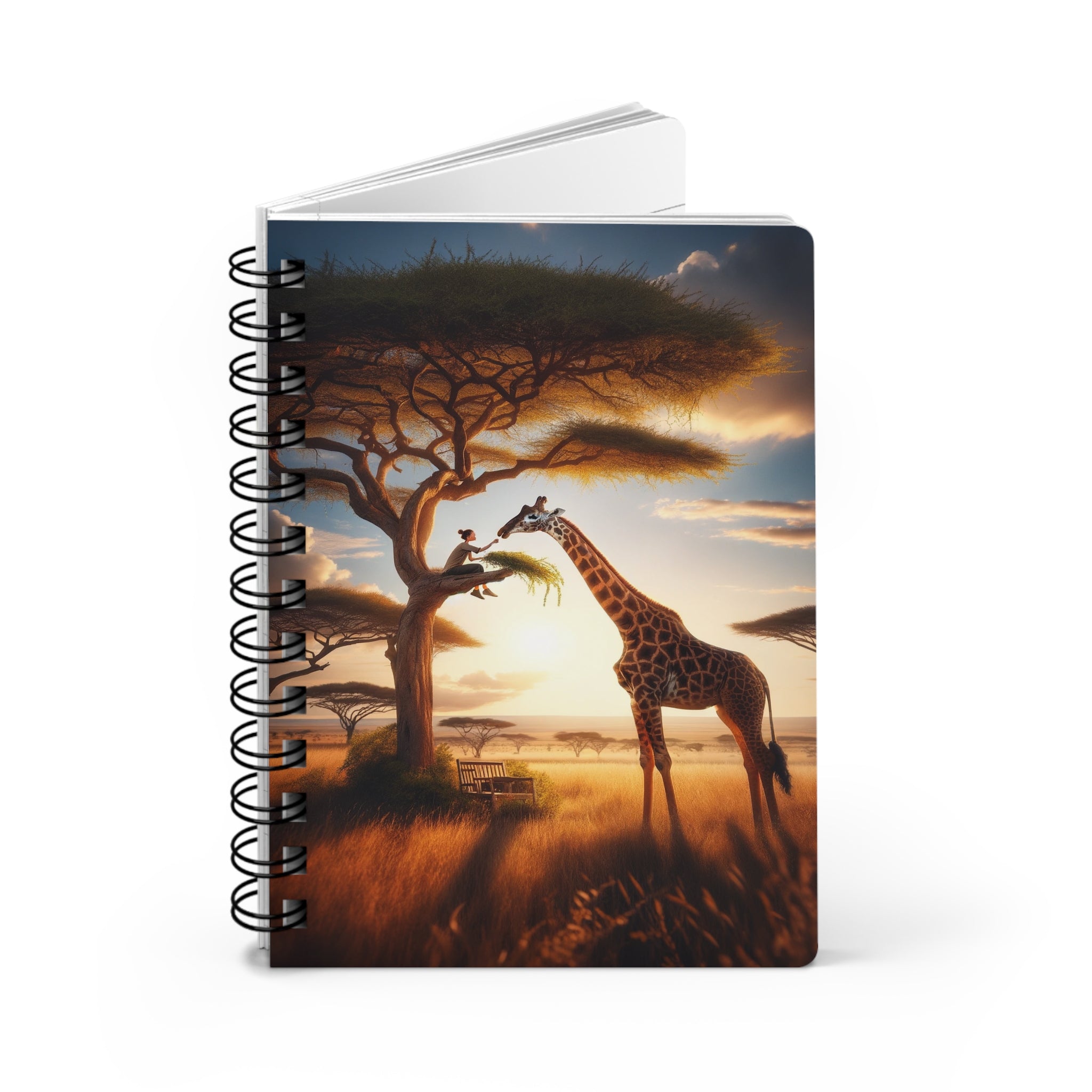 Girl feeding a giraffe from a tree - Spiral Notebook